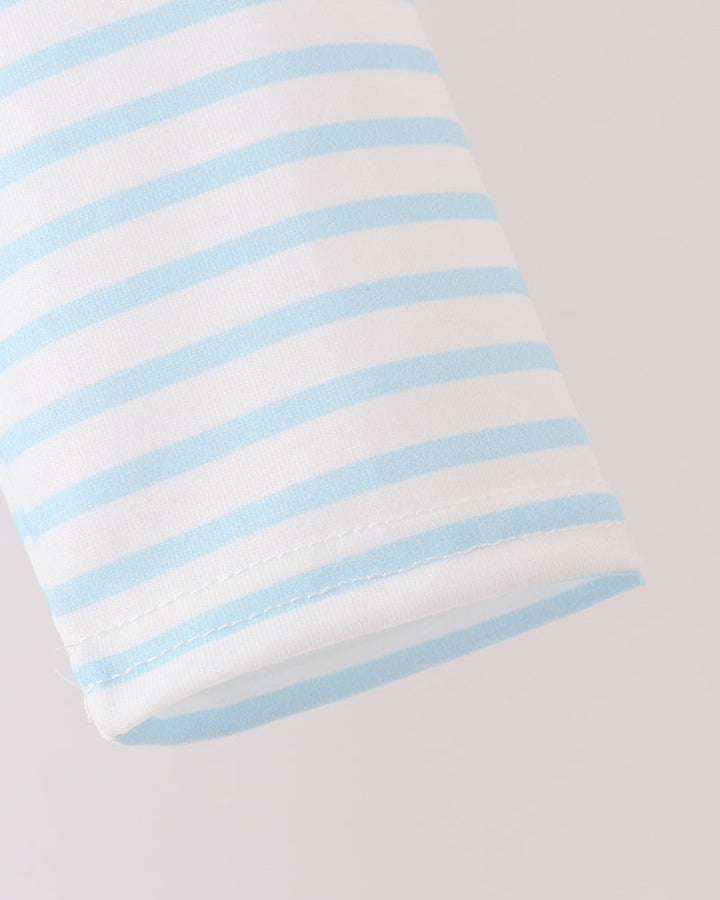 Blue-and-white striped top sleeve with stitched hem and plain design
