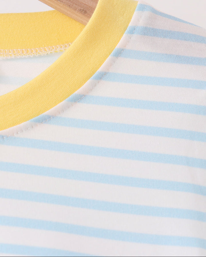 Blue-and-white striped top with yellow crew neckline trim