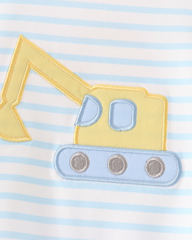 Striped romper with blue excavator appliqué