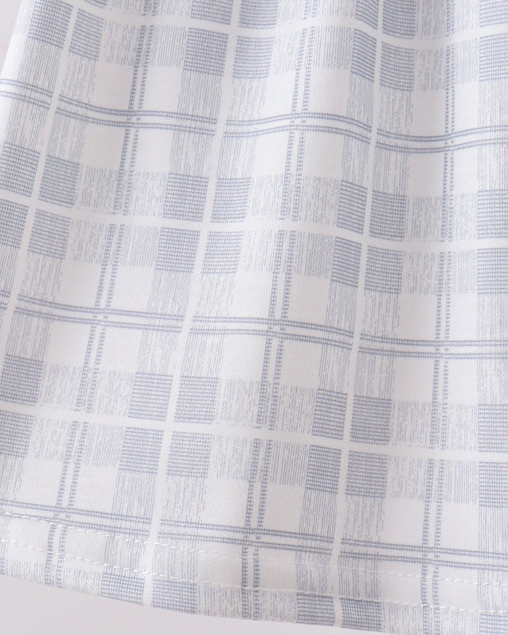 White plaid fabric with light blue-gray grid and gathered neckline seam