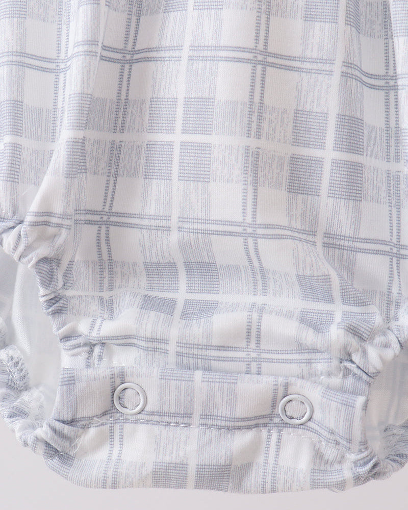 White plaid bubble romper with snap buttons and elastic leg openings, blue accents