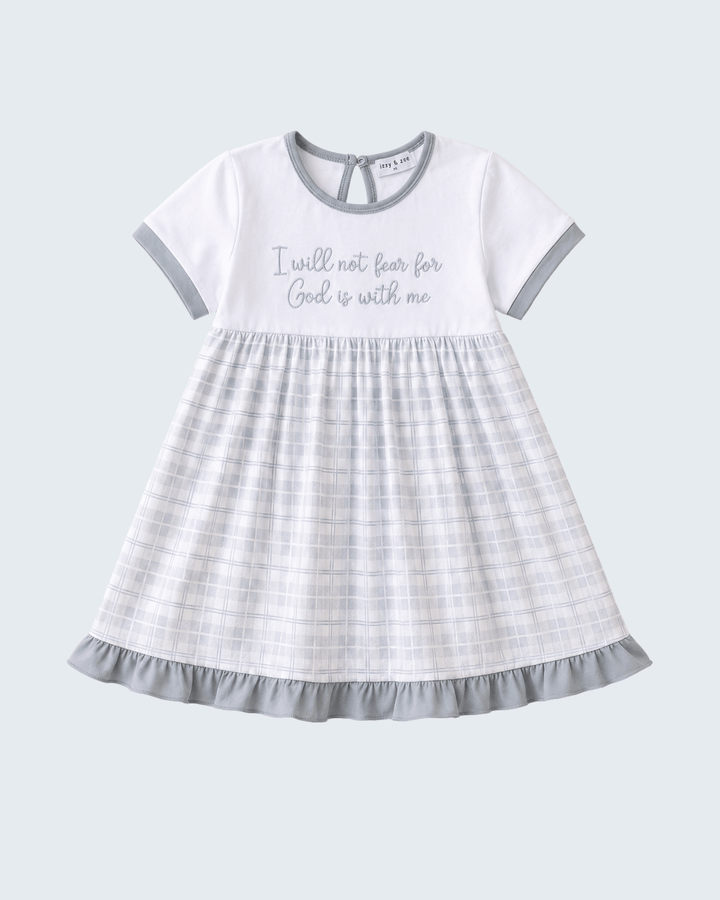 White girls’ dress with light gray plaid skirt and embroidered faith quote, ringer trim