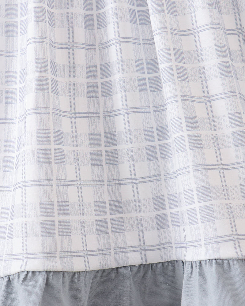 White gingham check skirt with layered ruffle hem and gray underlayer