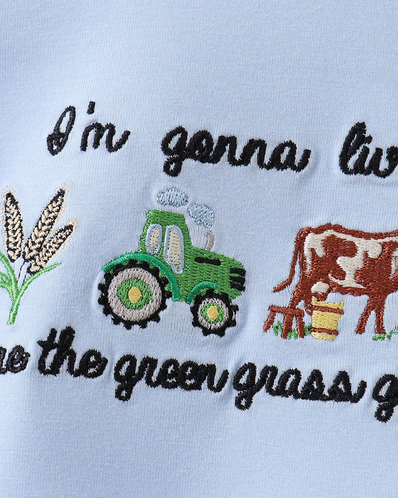 Embroidered design on fabric with text &