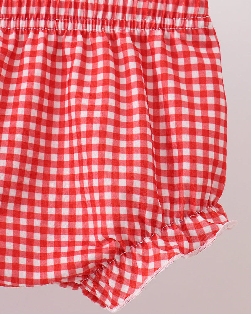 Red gingham baby bloomer with elastic waist and gathered ruffle hem