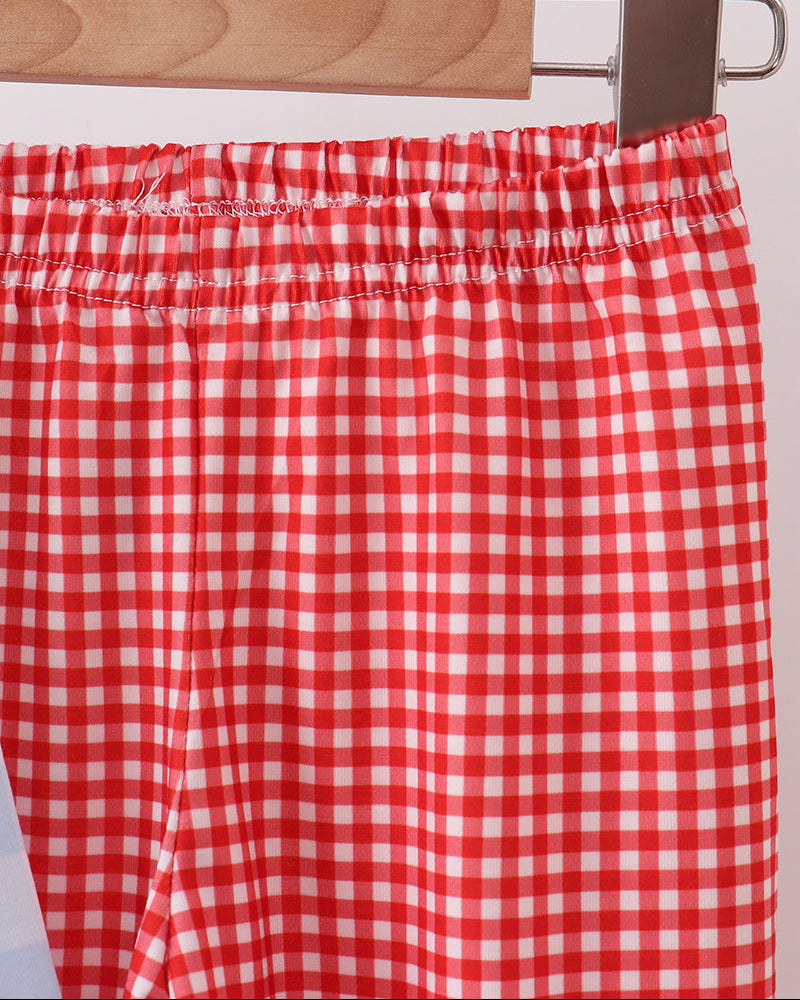 Red gingham pants with elastic waistband and gathered ruffle hem