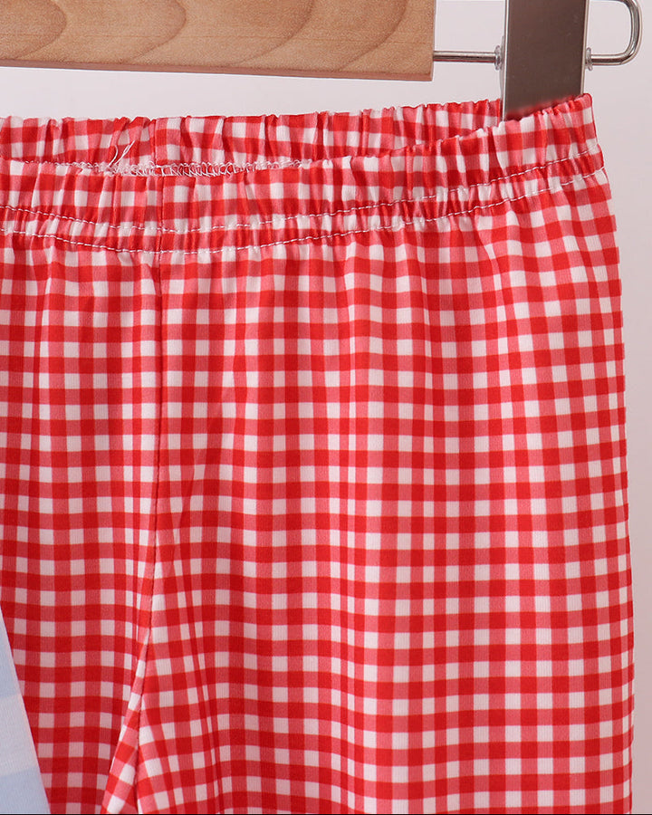 Red gingham pants with elastic waistband and gathered ruffle hem