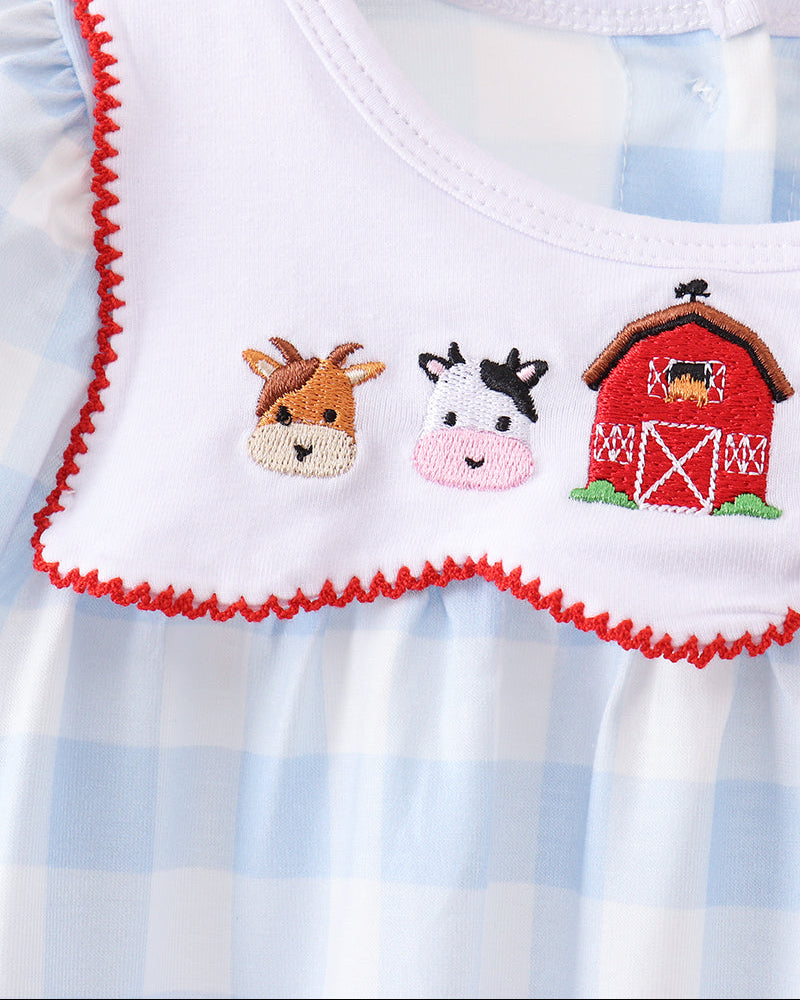 Blue gingham romper with white bib collar, red trim, and farm embroidery