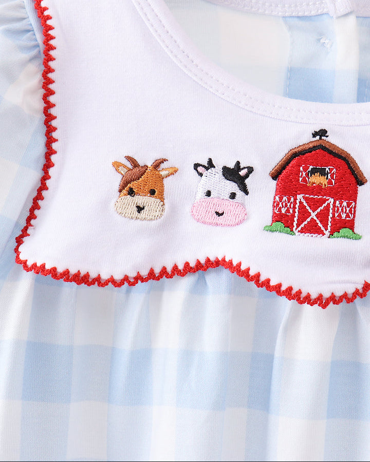 Blue gingham romper with white bib collar, red trim, and farm embroidery