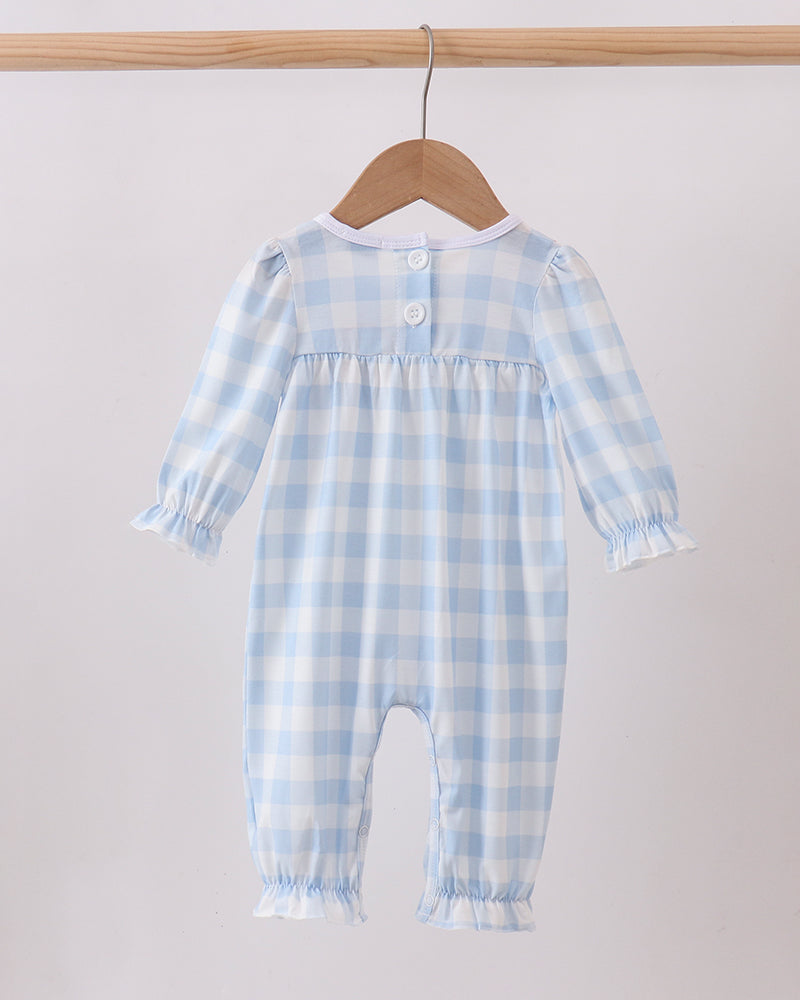 Light blue gingham romper with button placket and gathered waist
