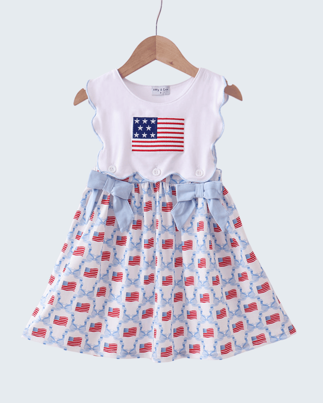 Children's dress with American flag pattern on a white background