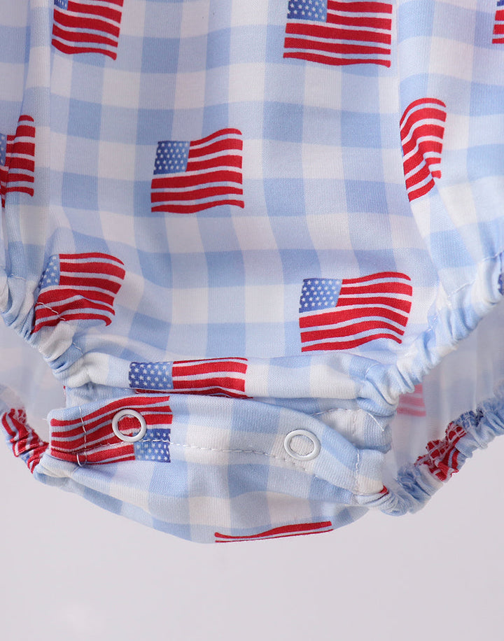 Baby romper with American flag pattern on a light blue checkered background