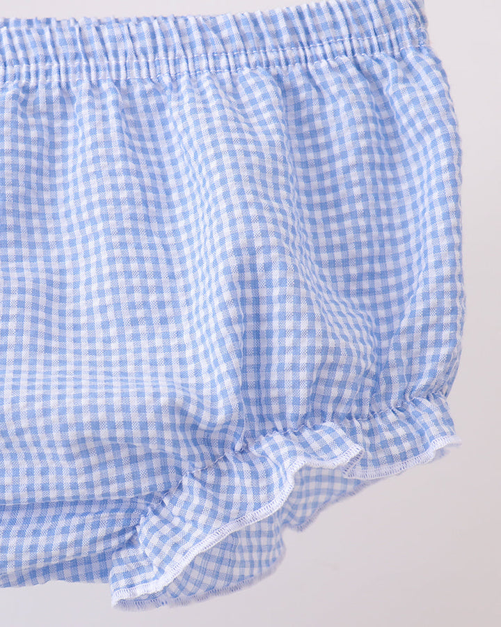 Blue and white checkered bloomers on a light gray background