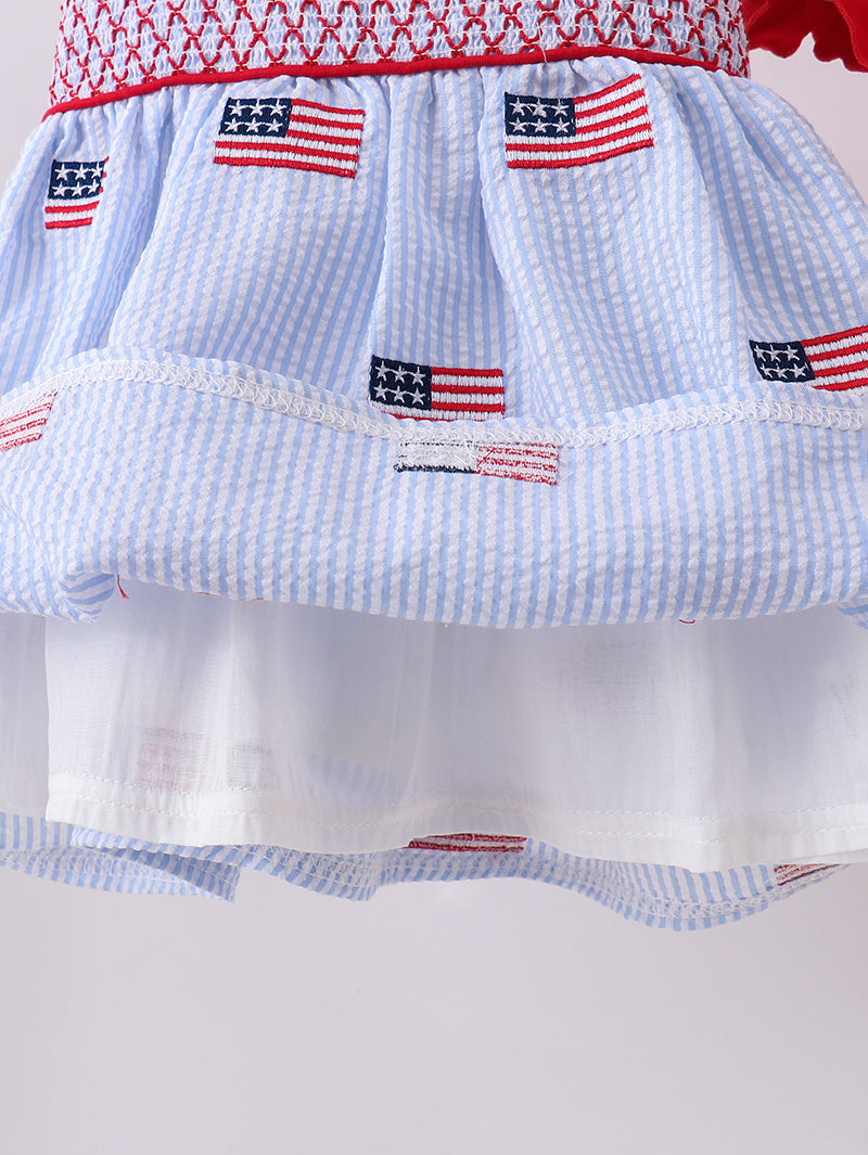 Dress with American flag patterns on a white background