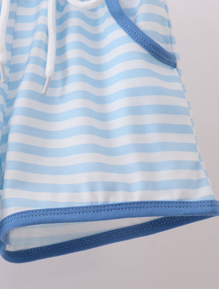 Blue and white striped garment on a light gray background