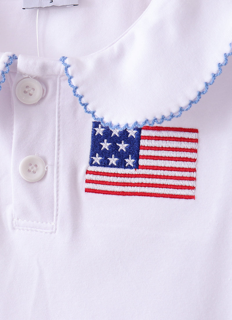 White shirt with American flag patch and blue trim on a white background