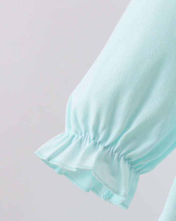 Aqua long-sleeve top with gathered sleeve cuff and ruffled hem