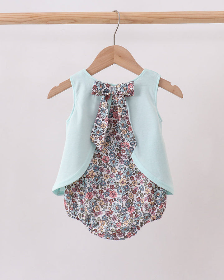 Light aqua baby romper with gathered floral bow back and ruffle neckline