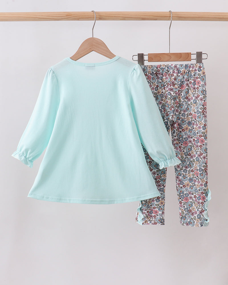 Kids long-sleeve aqua top and multicolor floral pants set on hanger