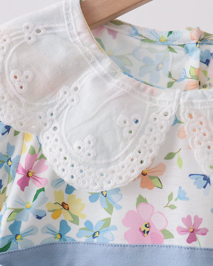 Floral dress with a white embroidered collar