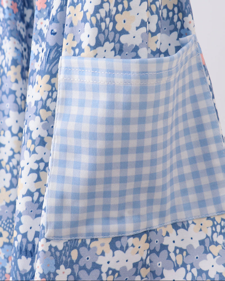 Blue floral dress with gingham front yoke and tiered A-line skirt