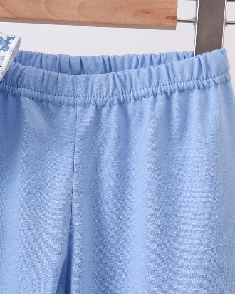 Light blue elastic-waist pants with clean straight legs