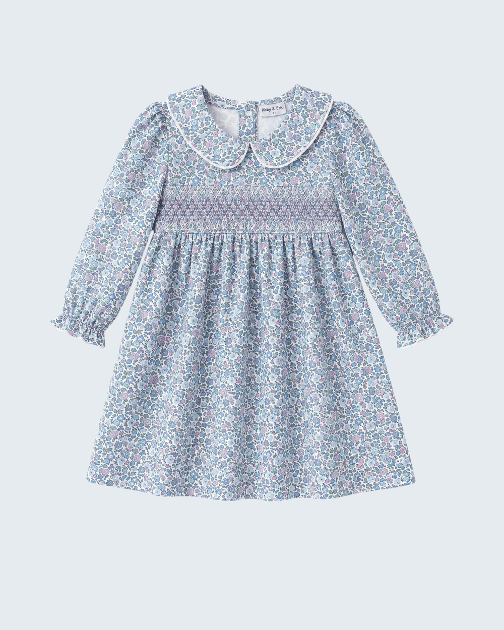 Blue floral smocked long-sleeve dress with Peter Pan collar and gathered skirt