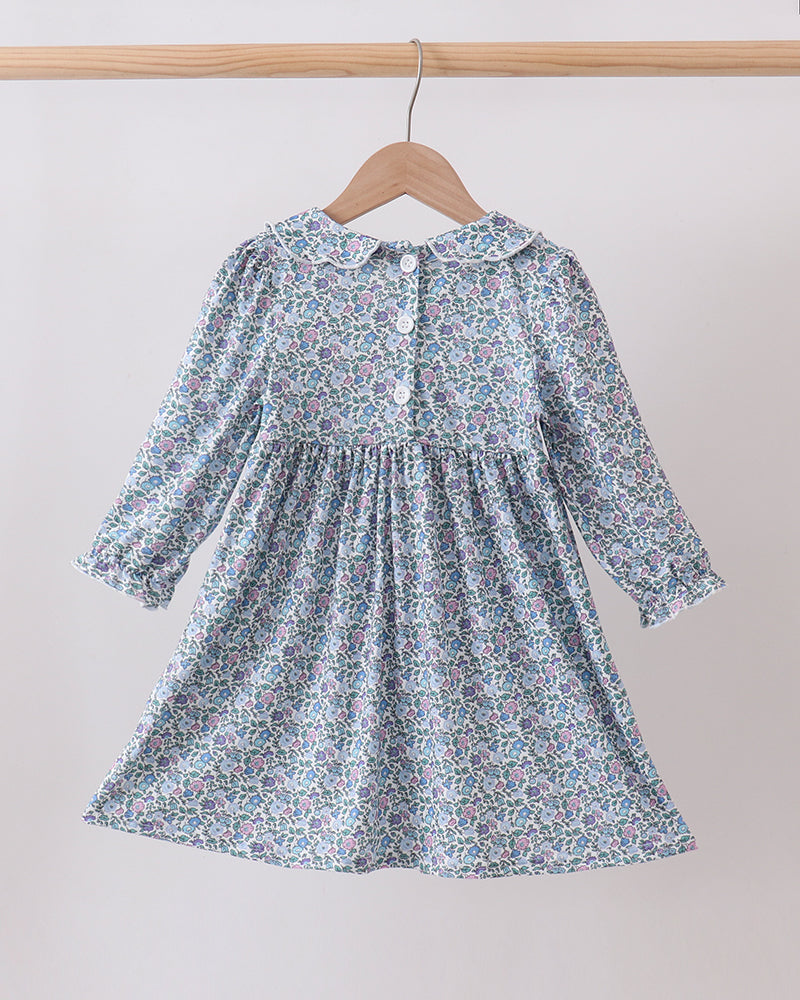 Light blue floral smocked long-sleeve dress with gathered skirt and ruffled neckline