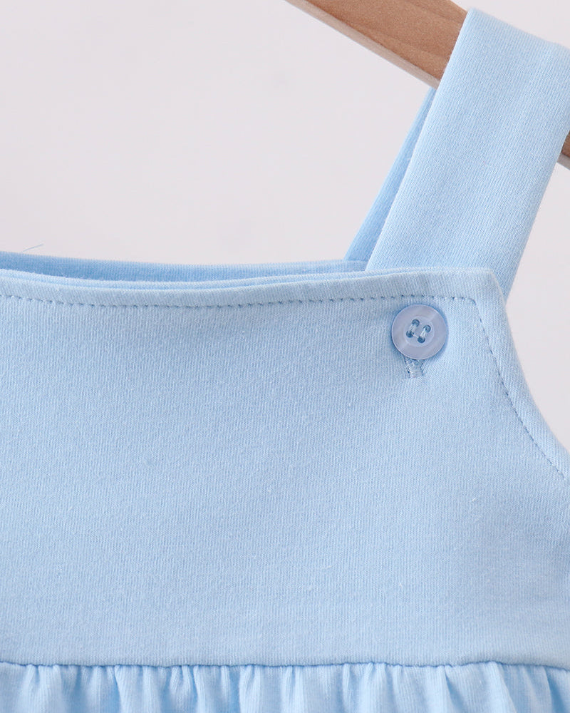 Light blue baby bubble romper with shoulder straps and small snap buttons at leg