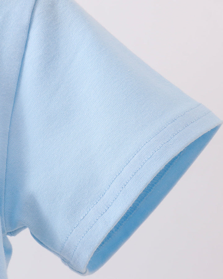 Light blue t-shirt sleeve with stitched hem and curved cuff opening