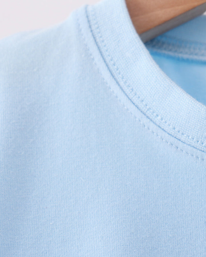 Light blue crew-neck t-shirt with double-stitched collar seam