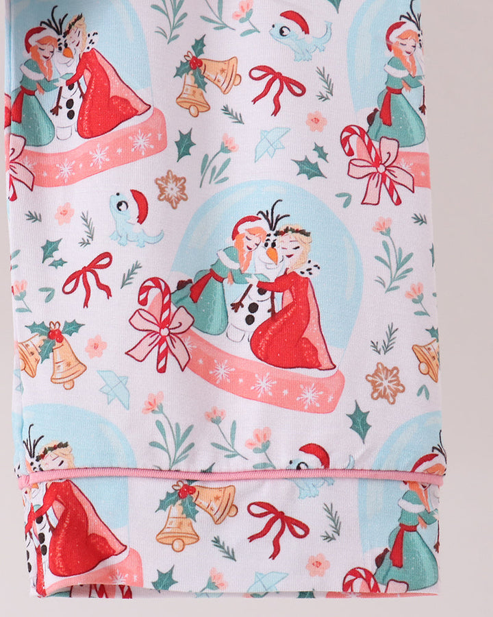 Light blue pajama pants with elastic waistband, festive skater girl and gift print