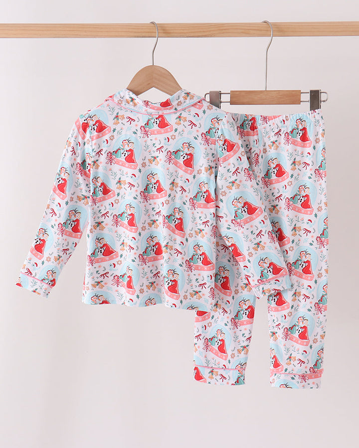 Kids pajama set on hanger: long-sleeve button shirt and elastic-waist pants, light blue print