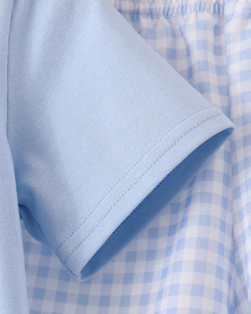 Light blue T-shirt sleeve with stitched cuff detail