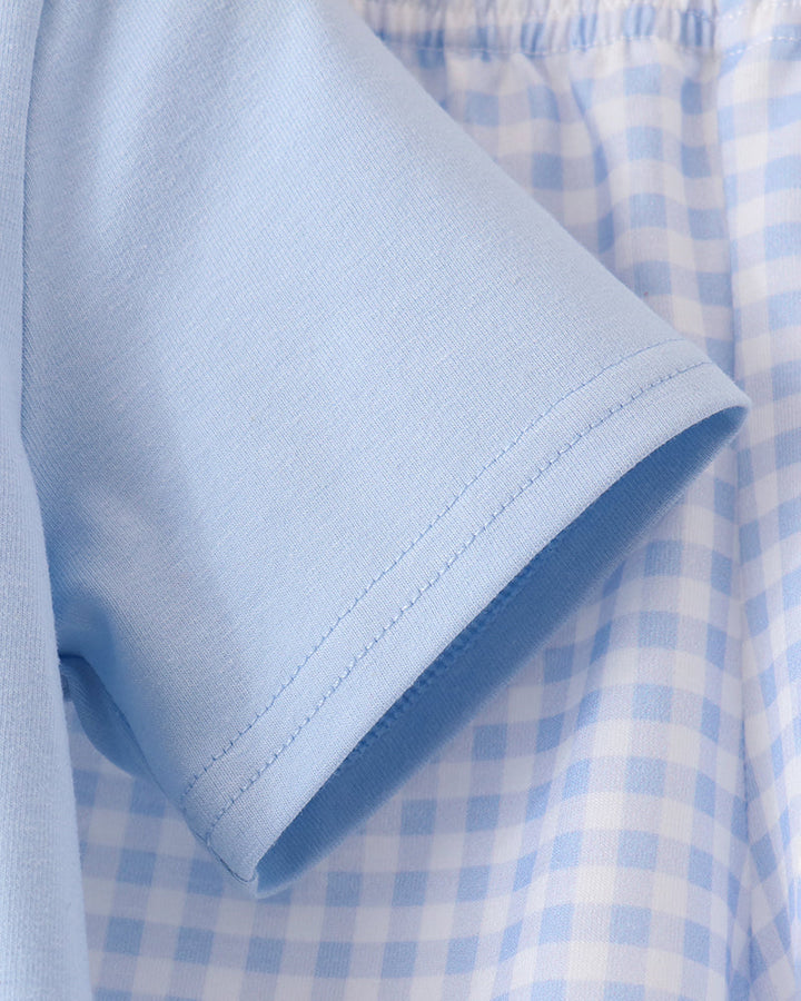 Light blue T-shirt sleeve with stitched cuff detail