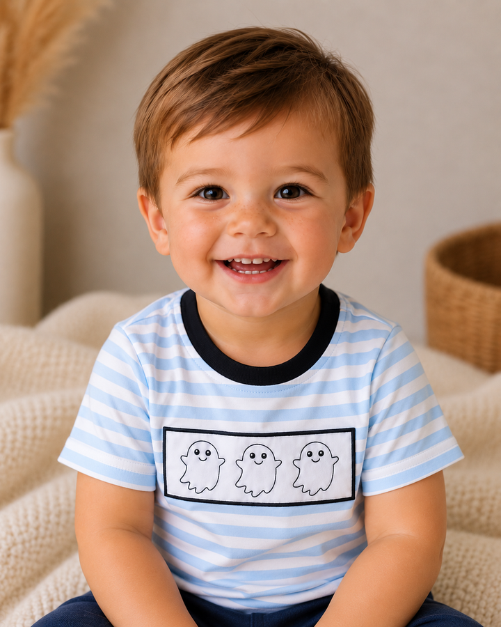 Light blue striped top worn by child with framed ghost embroidery