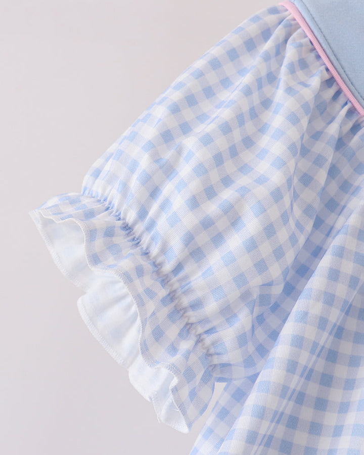 Light blue gingham dress with gathered ruffled sleeve and pink-trimmed edge