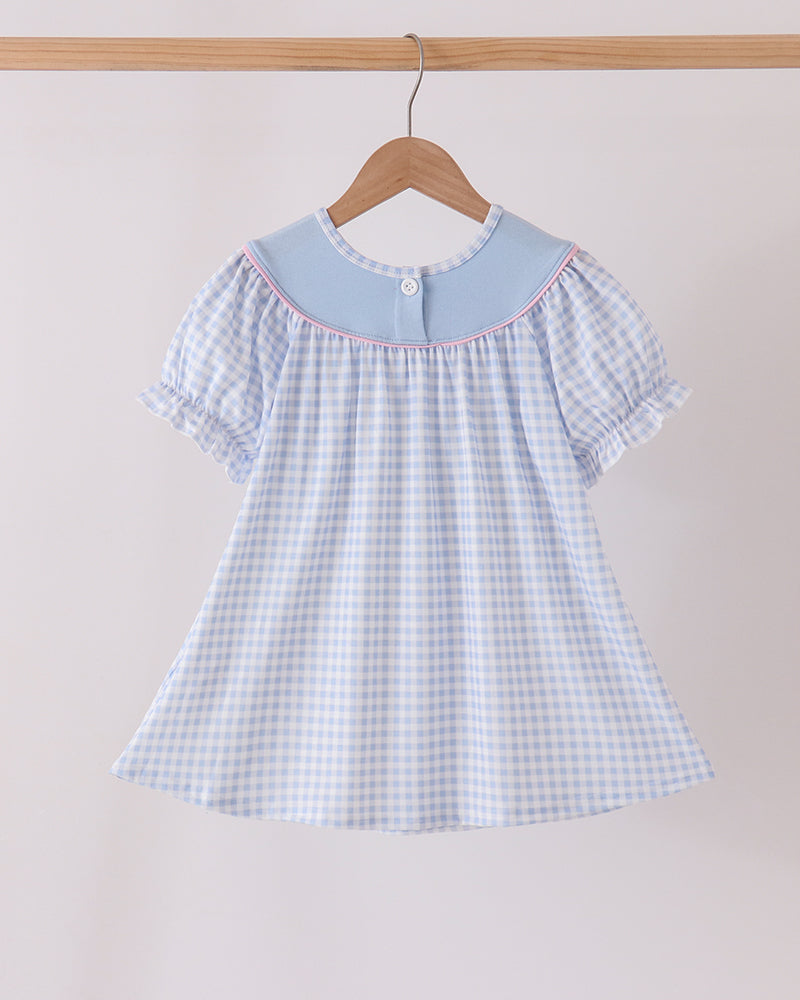 Light blue gingham dress with flutter sleeves and pink-trimmed Peter Pan collar