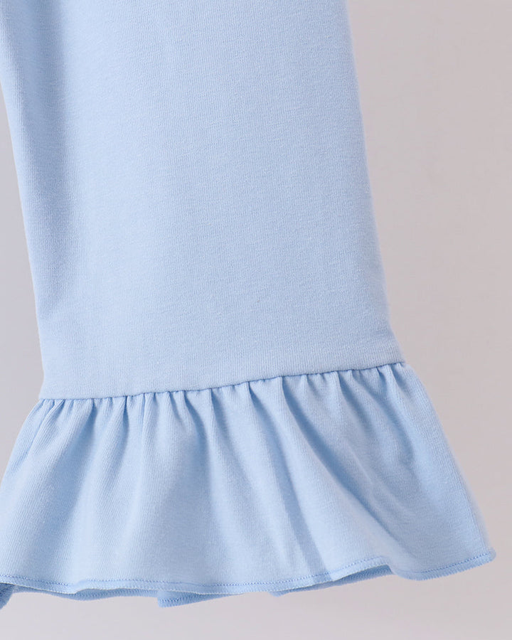 Light blue bell pants with gathered ruffle hem