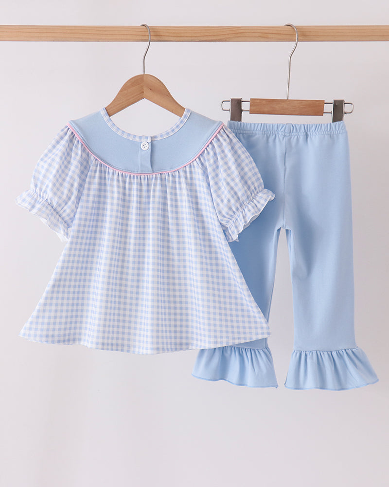 Blue gingham top paired with light blue ruffle bell pants, ghost applique
