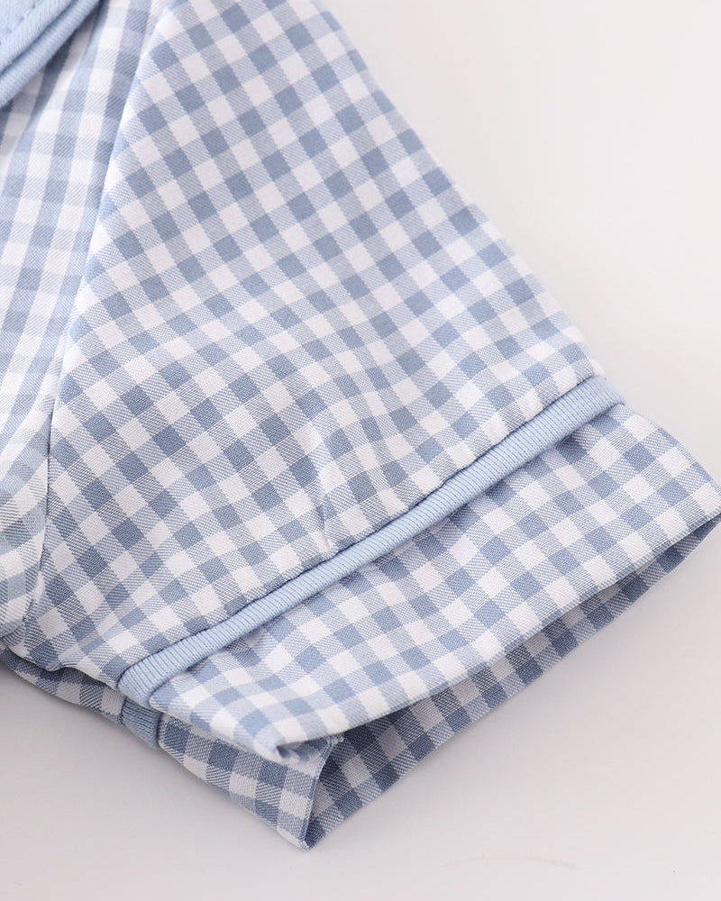 Blue gingham bubble romper sleeves and legs with blue trim and folded cuffs