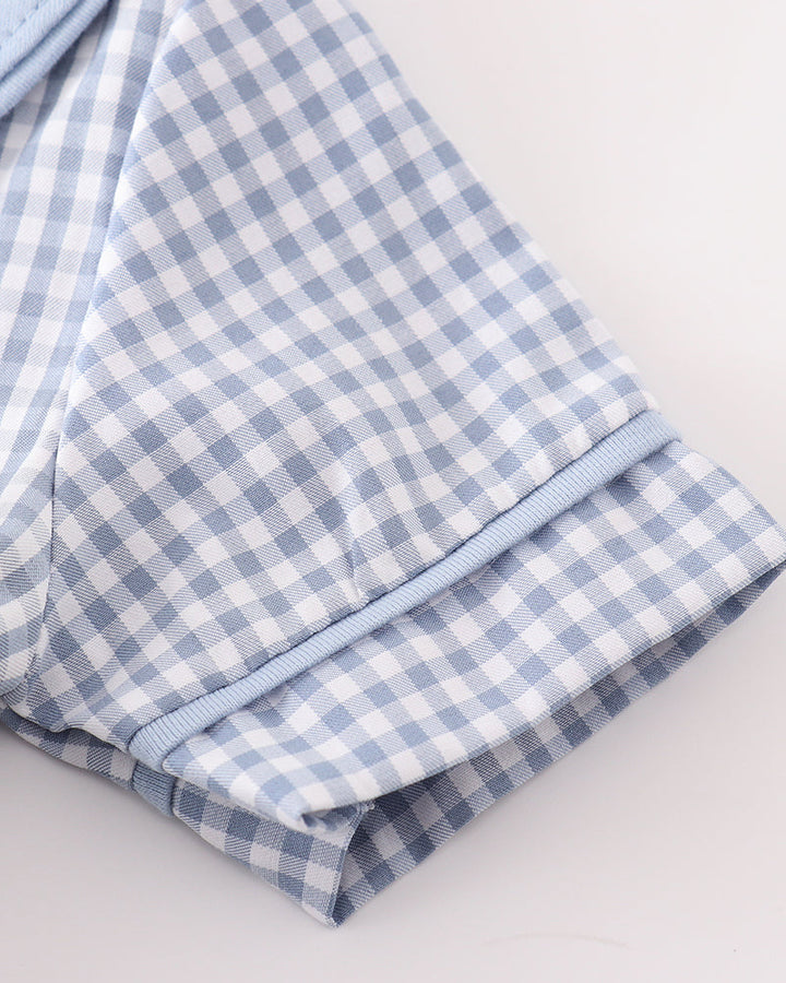 Blue gingham bubble romper sleeves and legs with blue trim and folded cuffs