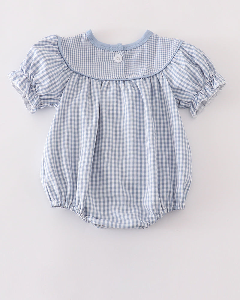 Light blue gingham bubble romper with puff sleeves and a buttoned neckline