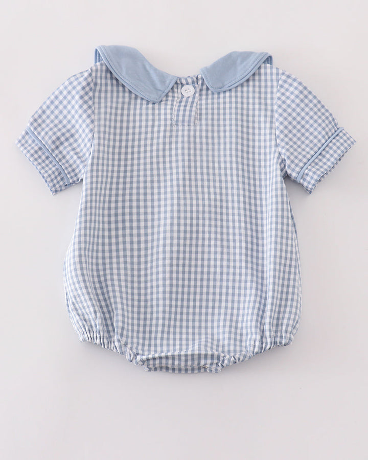 Light blue gingham bubble romper with short sleeves and blue Peter Pan collar