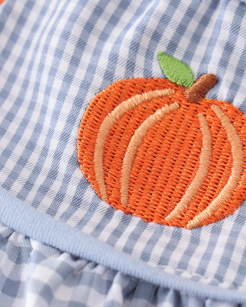 Blue gingham ruffle shirt detail with orange pumpkin and green leaf embroidery