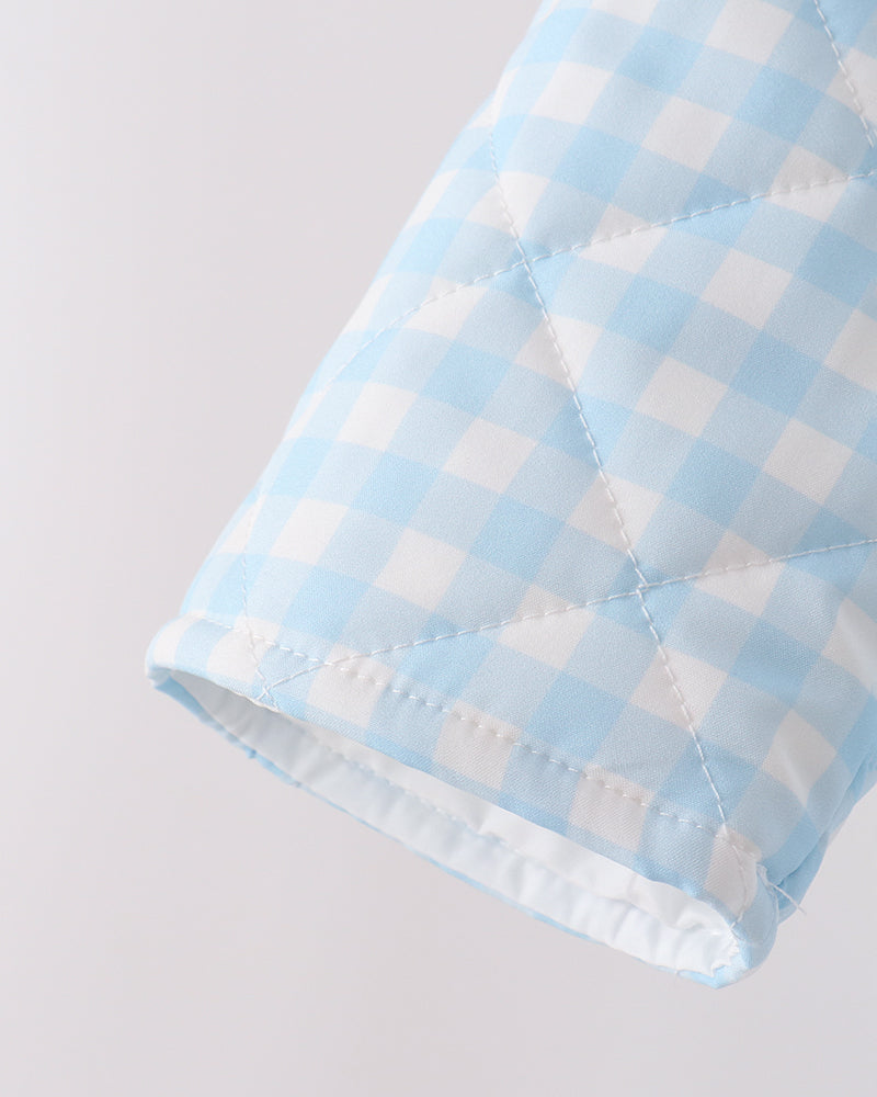 Light blue gingham jacket sleeve cuff with gathered white trim