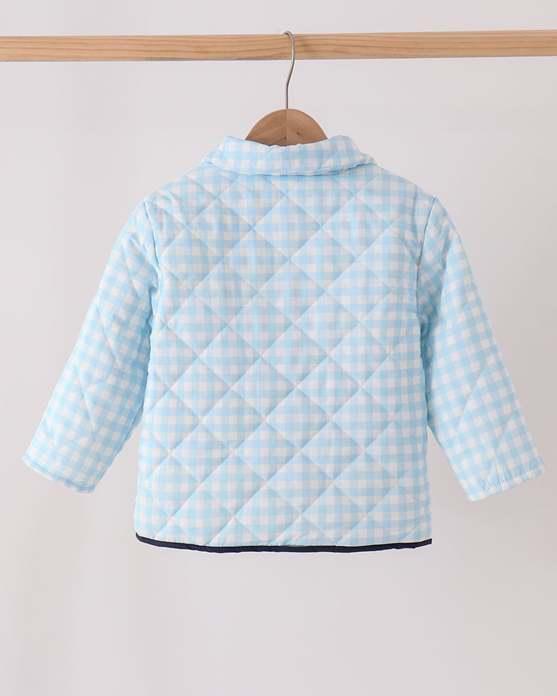 Light blue gingham jacket back with quilted panel seams and buttoned hem edge