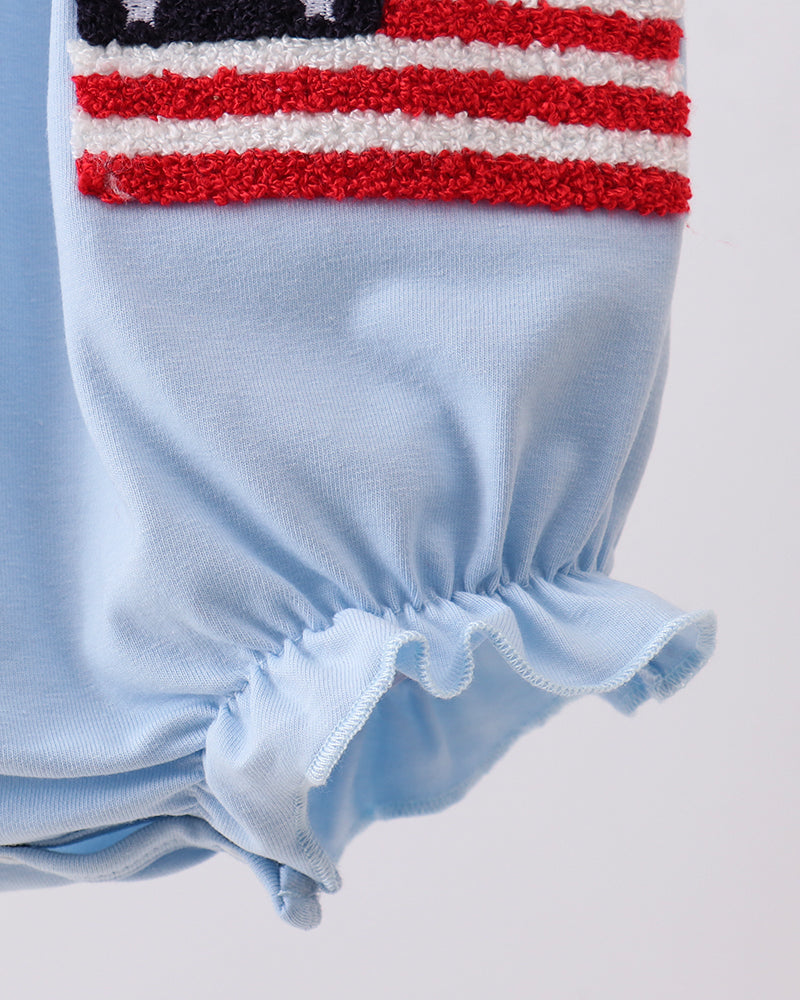 Light blue romper with flag