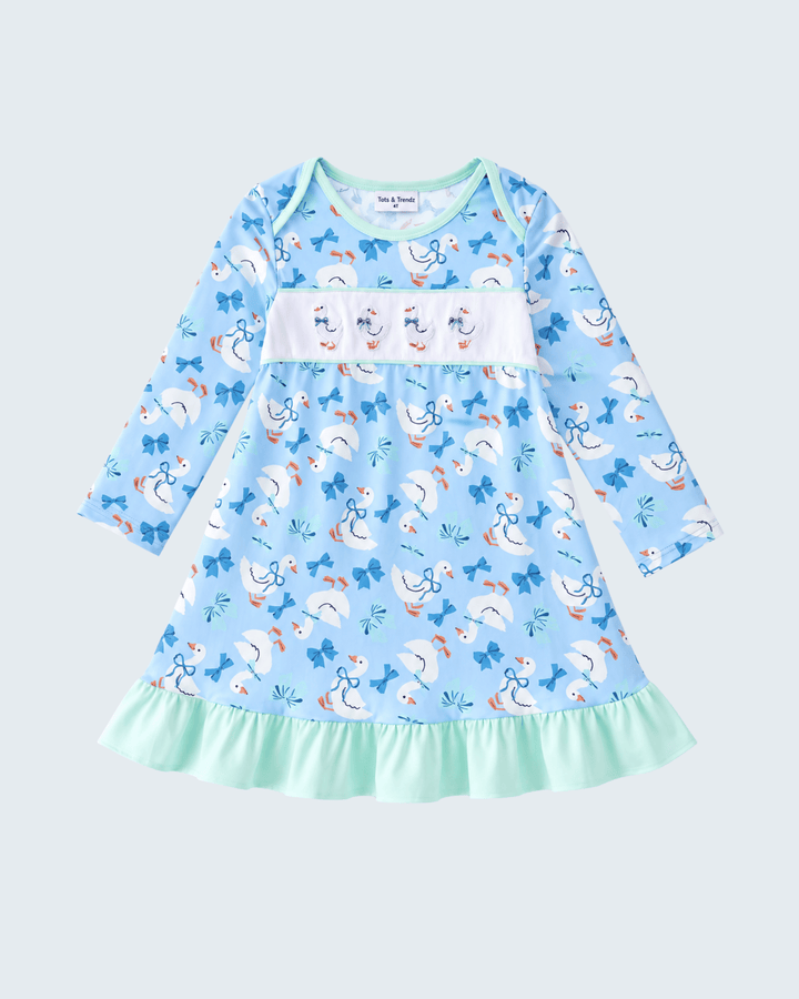 Light blue long-sleeve dress with goose-and-bow print and mint ruffle skirt