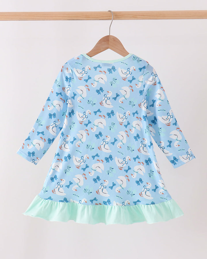 Light blue long-sleeve dress with goose-and-bow print and mint ruffle hem